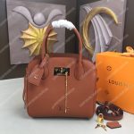 LV Milla PM Veau Nuage Gold