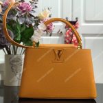 LV Capucines PM Taurillon Leather Ocre