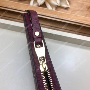 LV Clémence Wallet Monogram Empreinte Leather Raisin - Image 8