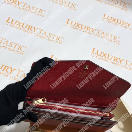 LV Sarah Wallet Monogram Empreinte Leather Scarlet - Image 9