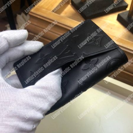 LV Pocket Organizer Taurillon Leather Noir - Image 7