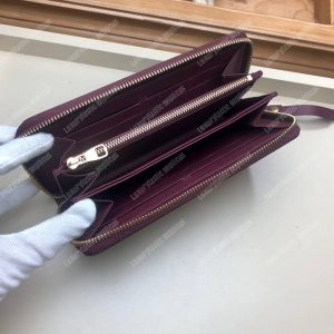LV Clémence Wallet Monogram Empreinte Leather Raisin - Image 3