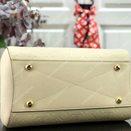 LV Montaigne MM Monogram Empreinte leather Creme - Image 8