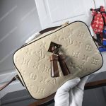 LV Saintonge Monogram Empreinte Leather Creme Caramel