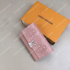 LV Compact Wallet Taurillion Leather Magnolia - Image 9