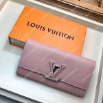 LV Capucines Wallet Taurillon Magnolia