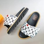 LOUIS VUITTON POOL PILLOW FLAT COMFORT MULES BLACK AND WHITE 261374