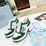 PRADA DOWNTOWN HIGH-HEELED LEATHER SNEAKERS WHITE/MANGO 1E792M