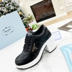 PRADA DOWNTOWN HIGH-HEELED LEATHER SNEAKERS BLACK 1E792M
