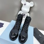 PRADA LOGO PLAQUE ANKLE BOOTS BLACK 1T782M